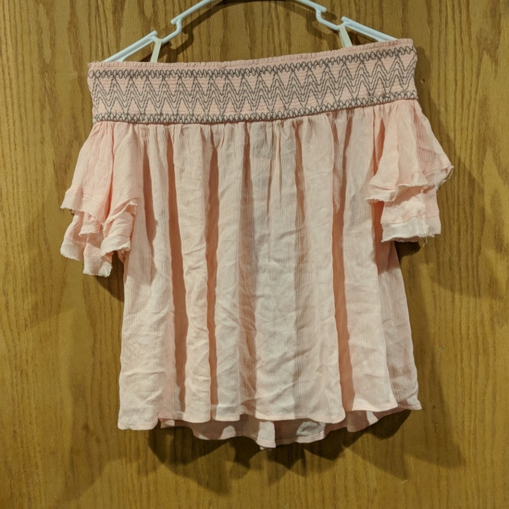 Light pink off the shoulder shirt